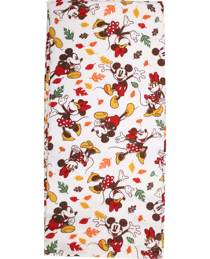 Mickey and Minnie Mouse fabric with autumn leaves on a white background
