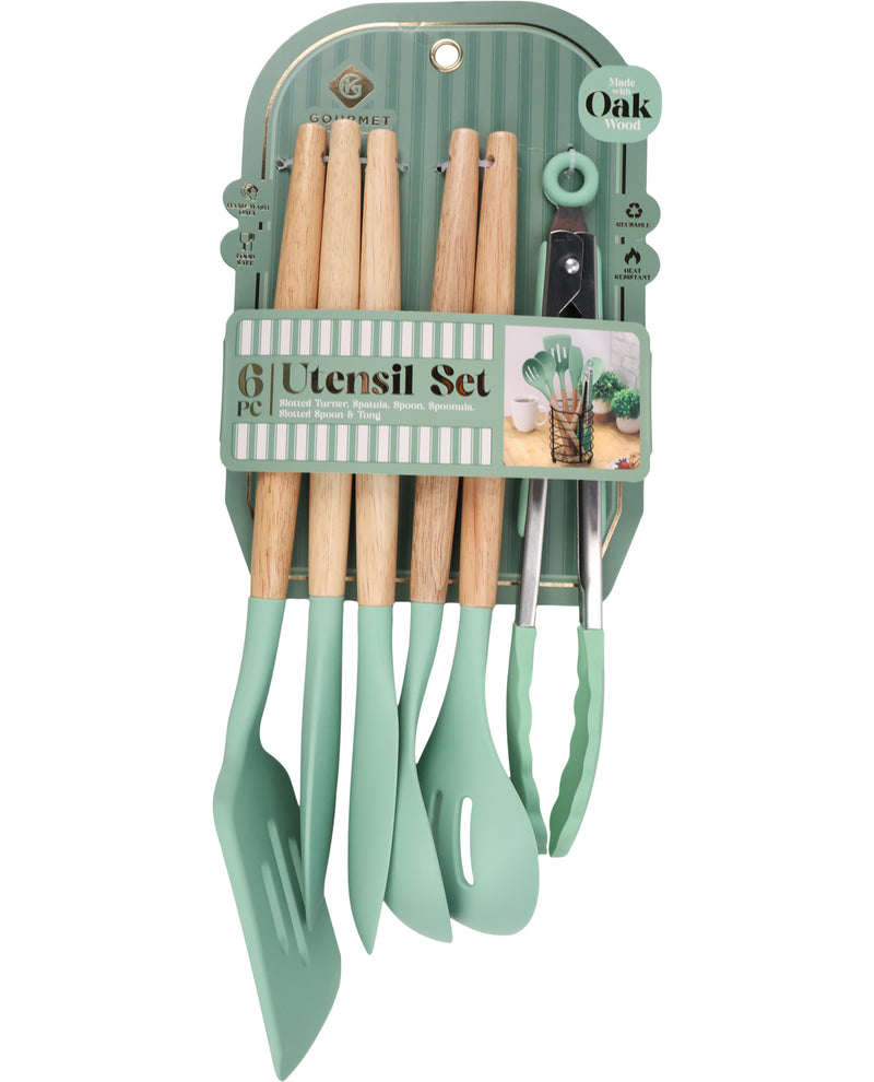 A 6-piece kitchen utensil set in mint green and natural oak wood, packaged in a matching green plastic holder with a decorative label.