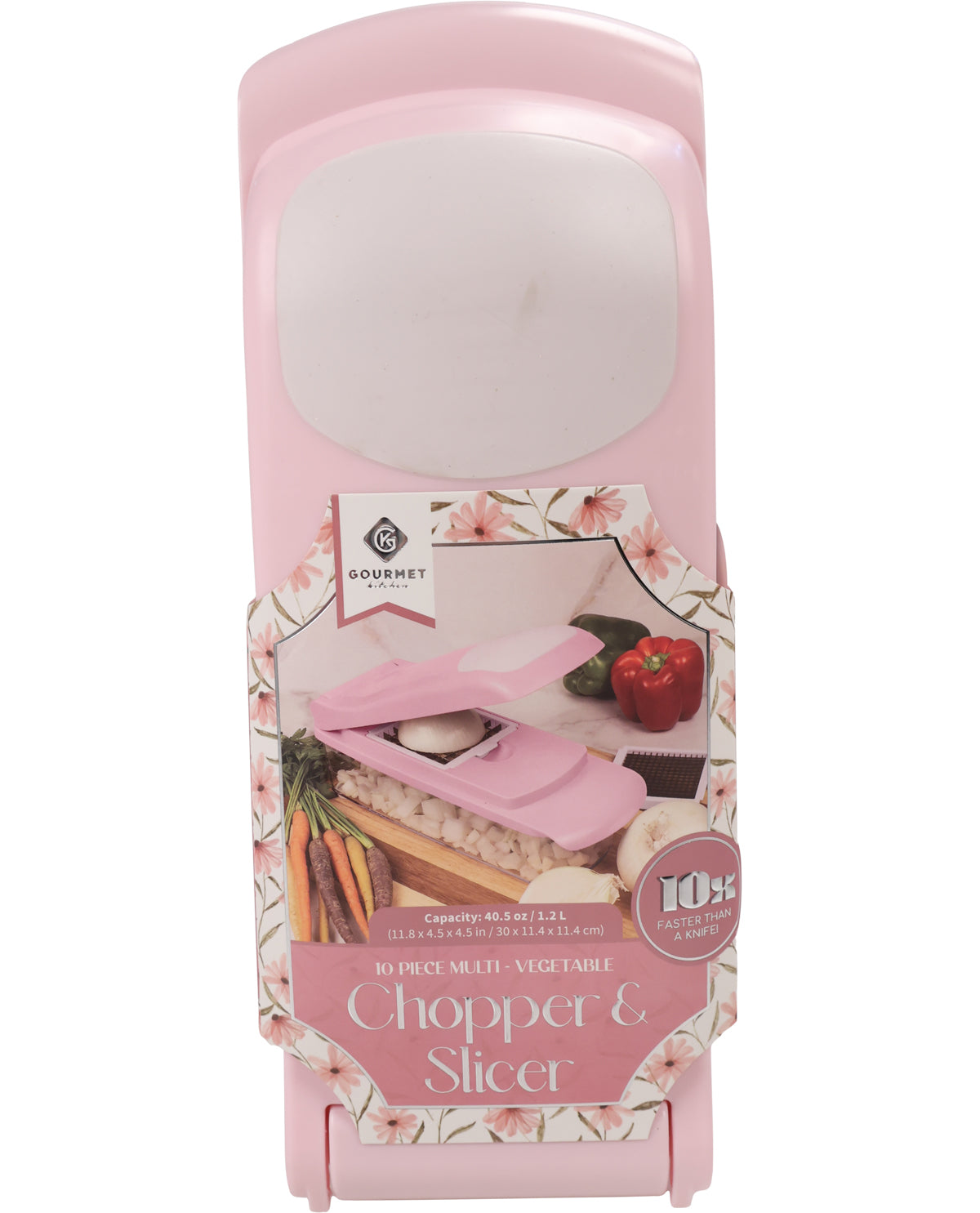 A pink countertop chopper and slicer shown in its retail packaging against a white background. The packaging features a floral border and an illustration of the pink device slicing vegetables.