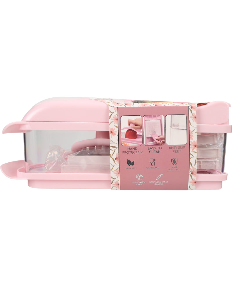 Pink plastic dishwasher filter basket with a clear window and a decorative pink paper band around the middle, shown on a white background.