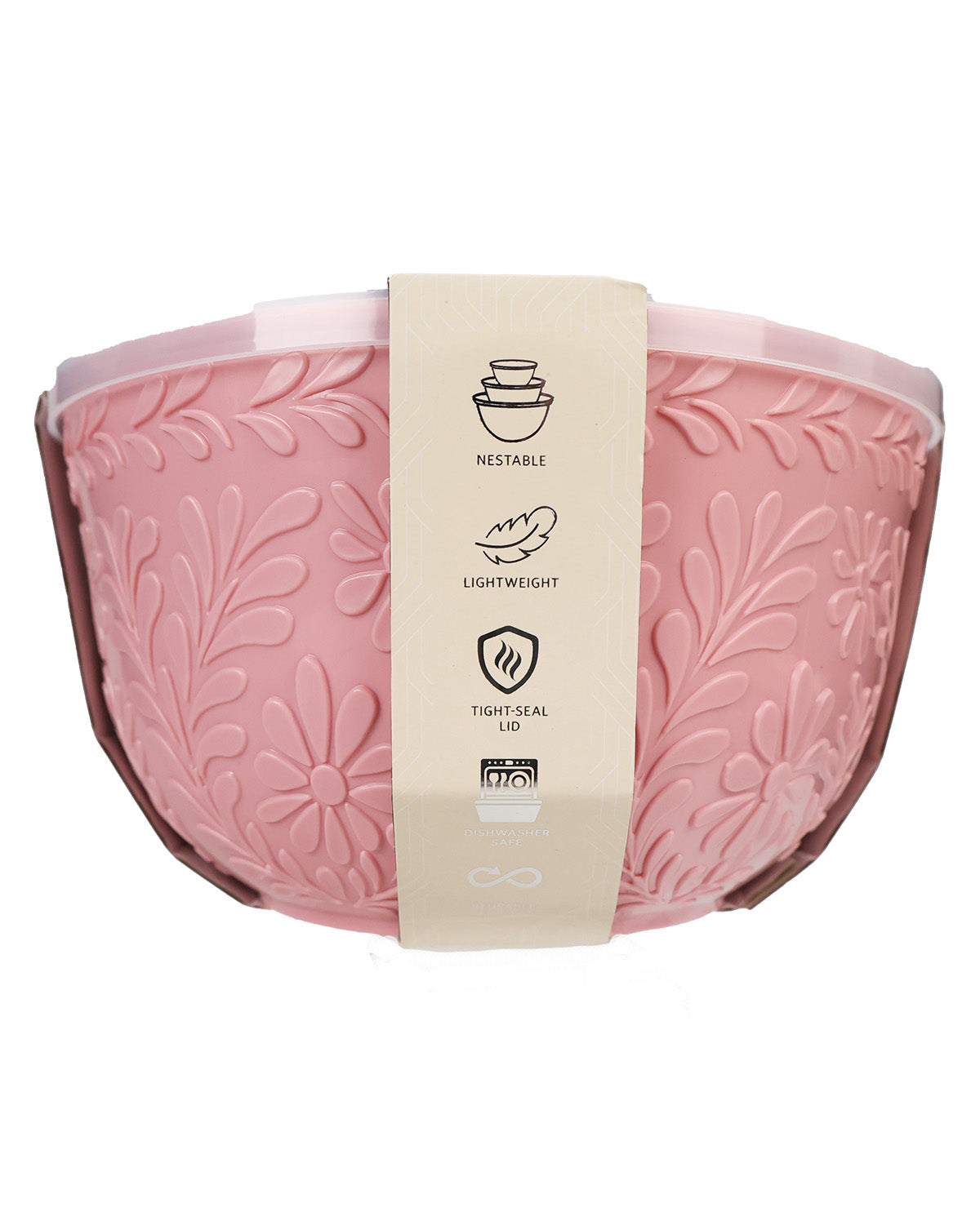 A pink ceramic mixing bowl with an embossed floral pattern, wrapped in a beige paper band showing product features, on a white background.