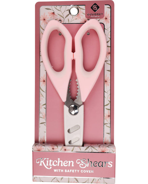 Pink kitchen shears with safety cover in packaging on a white background