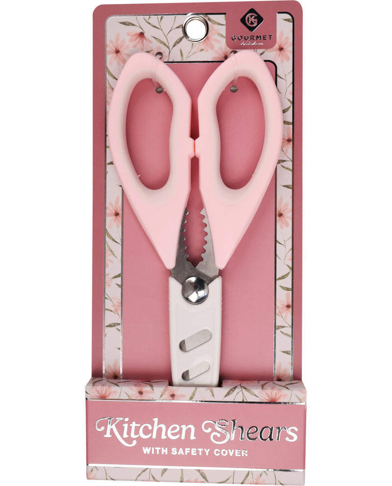 Pink kitchen shears with safety cover in packaging on a white background
