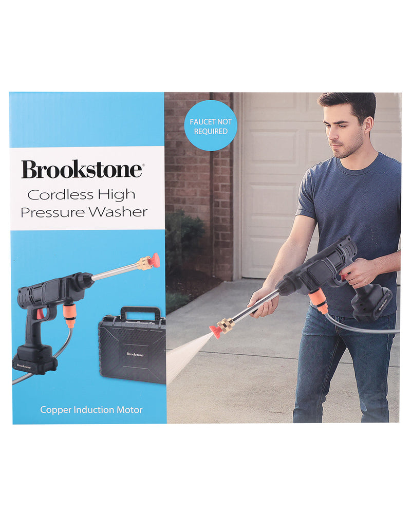 Brookstone cordless high pressure washer shown in a lifestyle context with a man using it in a driveway, alongside product graphics and text on a blue and white box.