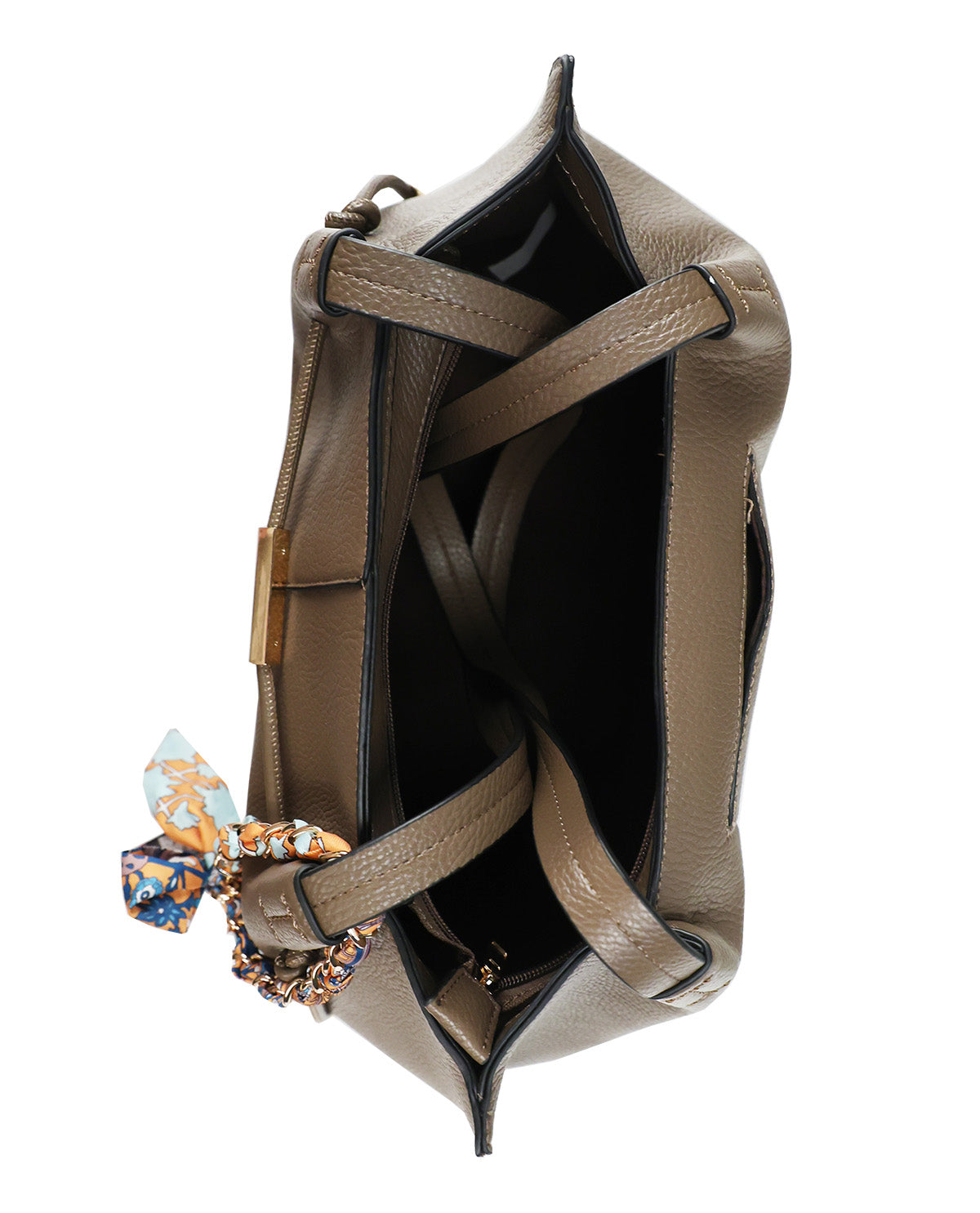 A taupe brown pebbled leather handbag shown from an overhead angle, open to reveal its black interior. It features a matching taupe leather strap with a decorative multicolor patterned fabric bow attached near the zipper.