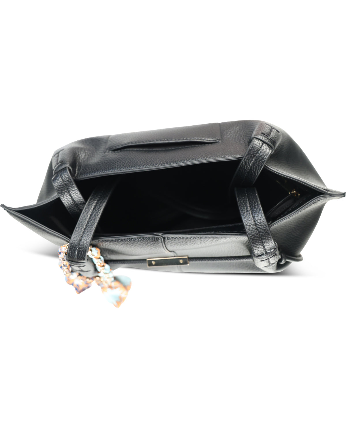Black leather handbag shown open from the top, featuring a structured silhouette, dual top handles, a zippered closure, and a small hanging charm with a pastel pattern, photographed on a white background.