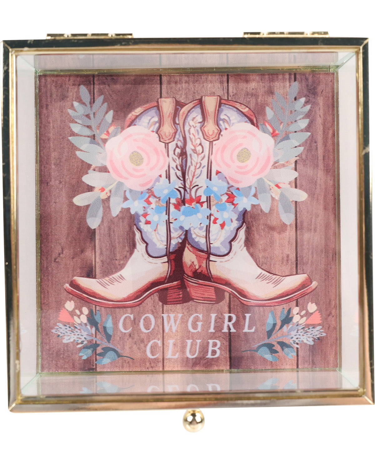 Decorative box with cowboy boots and flowers on a wooden background, labeled 'Cowgirl Club'.
