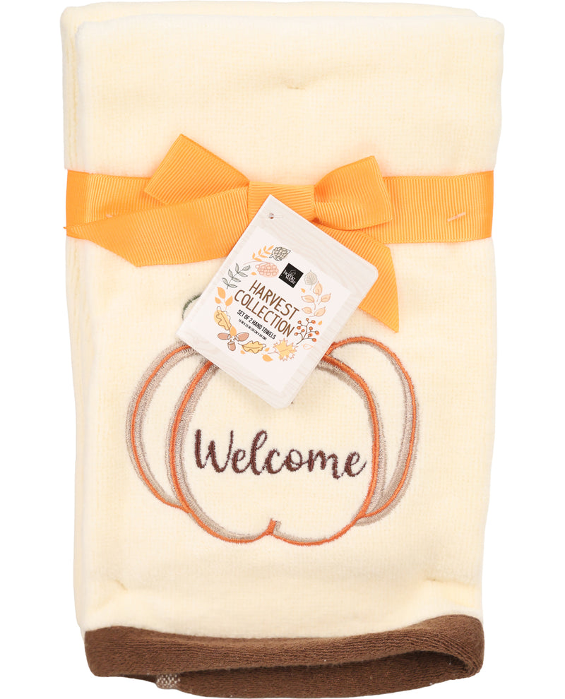Blanket with pumpkin design and 'Welcome' text, tied with an orange ribbon on a white background.