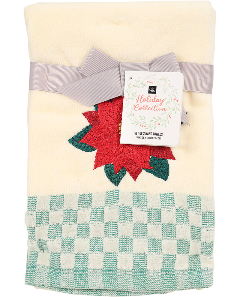 Set of two hand towels with a poinsettia design and checkered pattern, featuring a brand tag.
