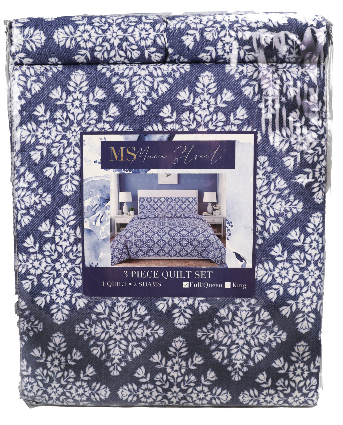 A packaged 3-piece quilt set by MSN America, featuring a navy blue and white damask pattern on the fabric, with a central product label showing a bed setup.