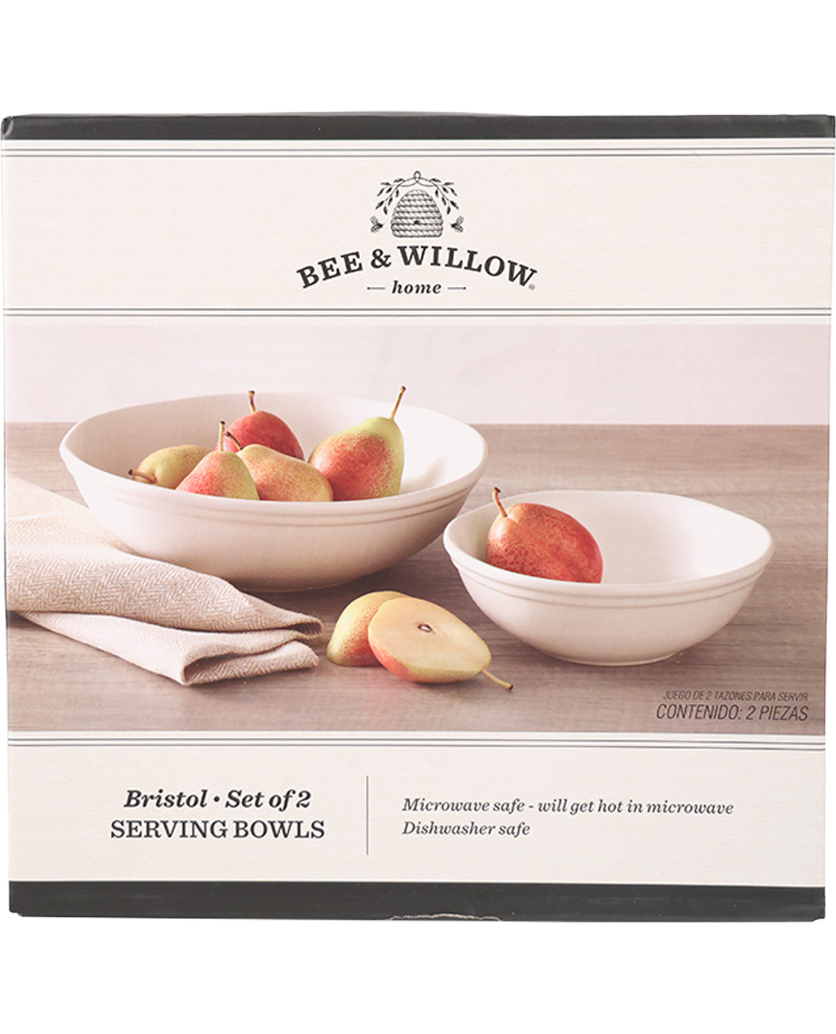 Bee & Willow home Bristol set of 2 serving bowls in their retail packaging box. The packaging features a photo of the two white ceramic bowls containing pears on a wooden table, with product details listed below.