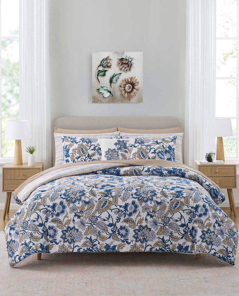 Bedroom with floral bedding set on a bed, two nightstands, and a wall art piece.