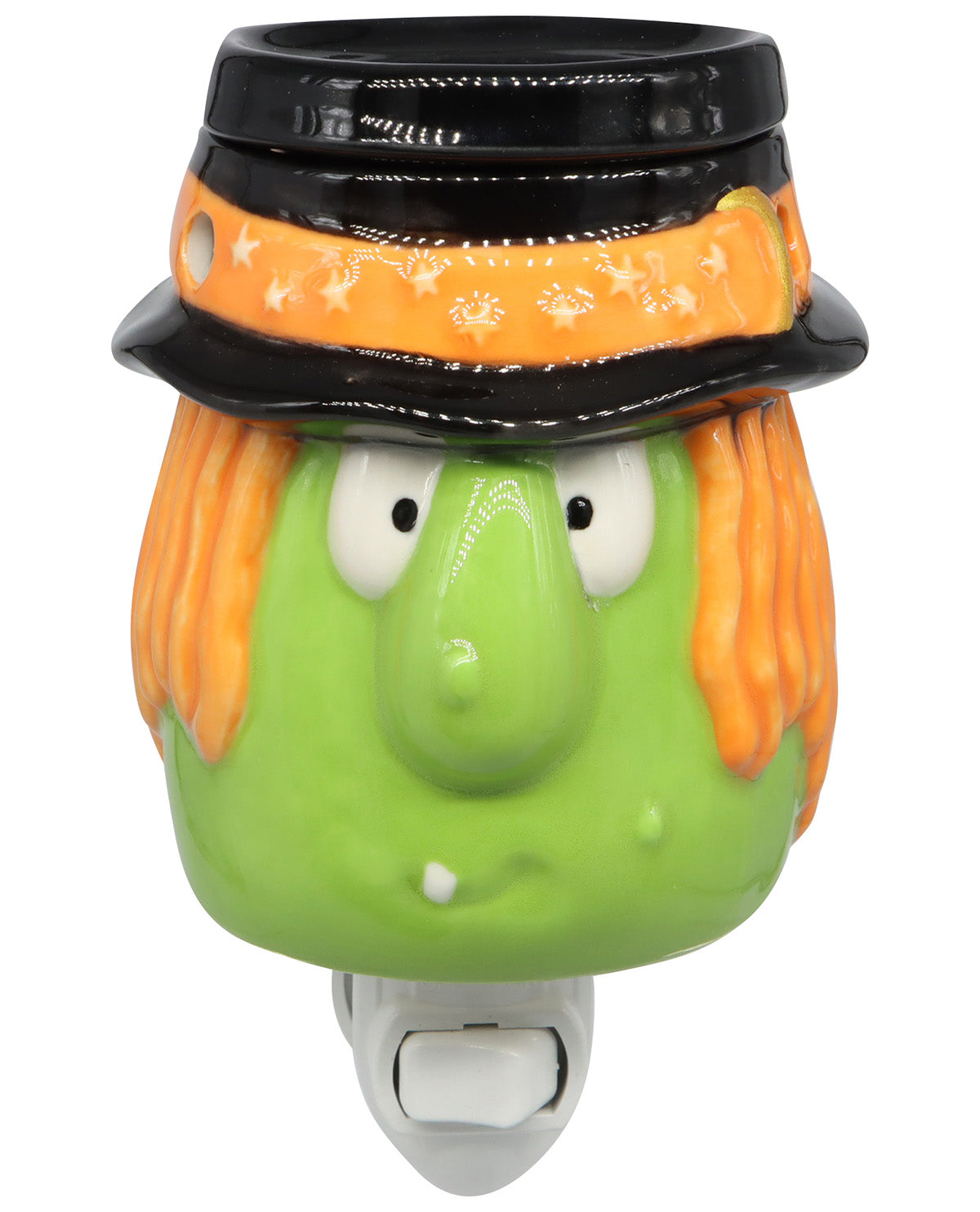 A ceramic witch character night light with a green face, orange hair, and a black hat with an orange band, shown on a white background.