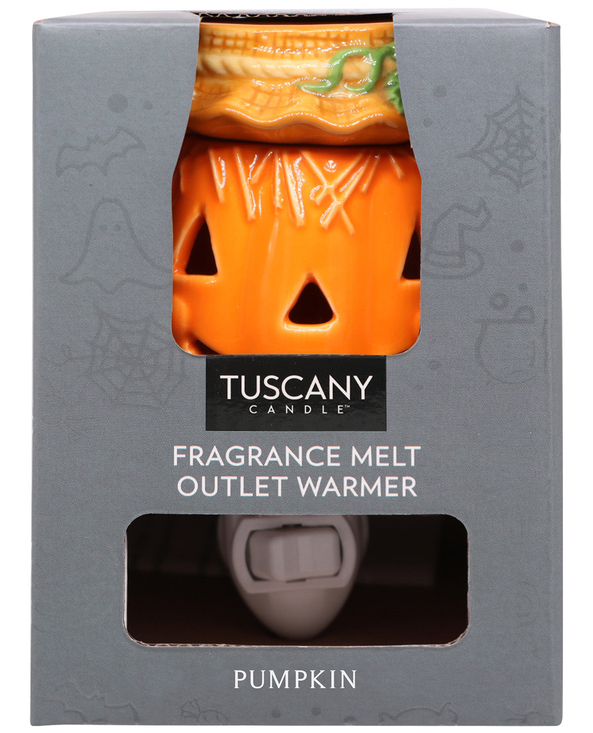 Tuscany Candle Pumpkin Fragrance Melt Outlet Warmer in its original gray packaging box, showing the orange jack-o'-lantern-shaped warmer and the white plug through the window cutouts.