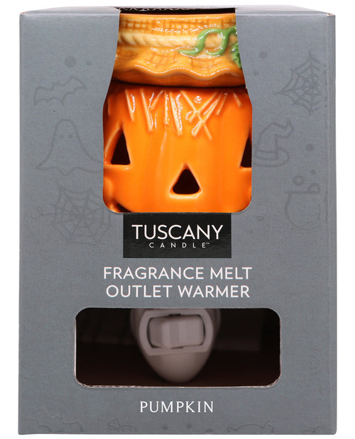 Tuscany Candle Pumpkin Fragrance Melt Outlet Warmer in its original gray packaging box, showing the orange jack-o'-lantern-shaped warmer and the white plug through the window cutouts.