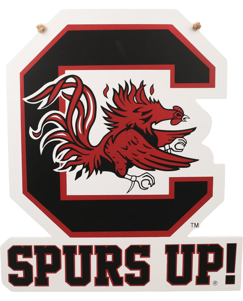 Decorative sign with a red and black rooster logo and 'SPURS UP!' text on a white background.
