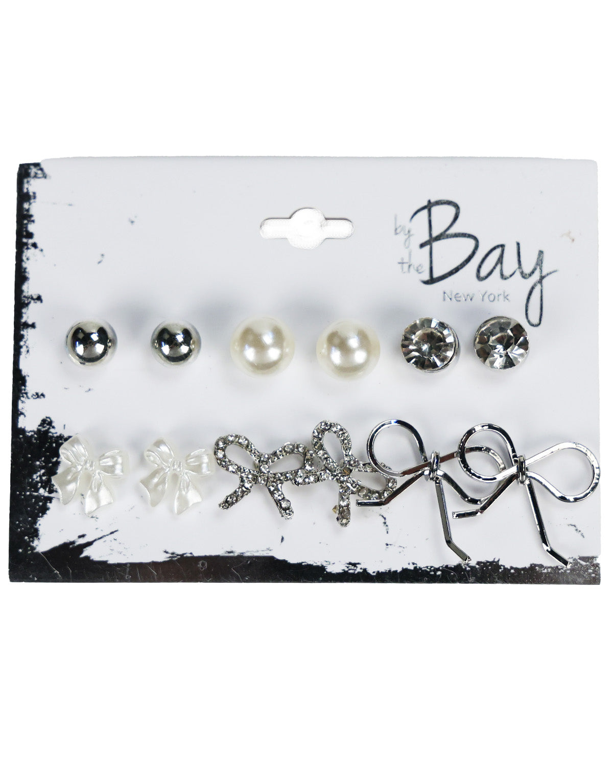 A 10-piece stud earrings set by the Bay New York on a white display card. The set includes five pearl and crystal stud earrings on the top row, and five silver and white crystal bow stud earrings on the bottom row.