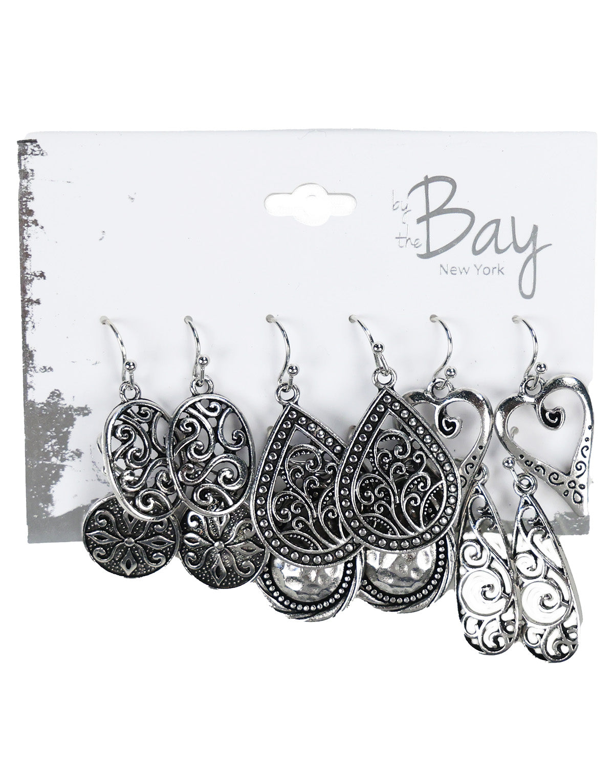 A set of six silver-toned filigree dangle earrings on a white display card with the brand name 'Bay New York' printed on it.