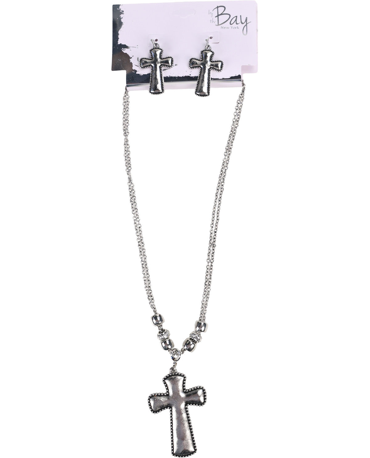 A silver-toned jewelry set from Bay, featuring a cross pendant necklace and matching cross stud earrings, displayed on a white branded card against a white background.