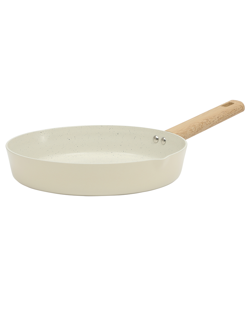 White frying pan with a wooden handle on a white background