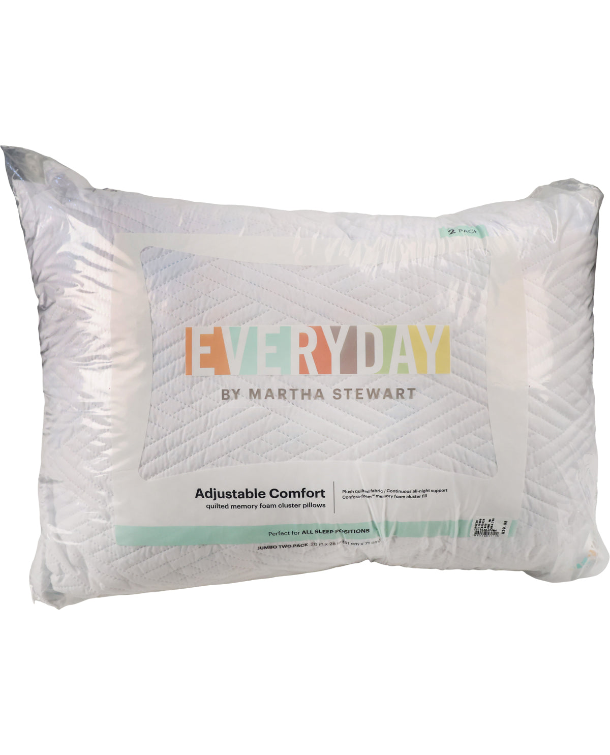 A white quilted pillow from Everyday by Martha Stewart, shown in its clear plastic packaging with the brand logo and product details printed on the front.