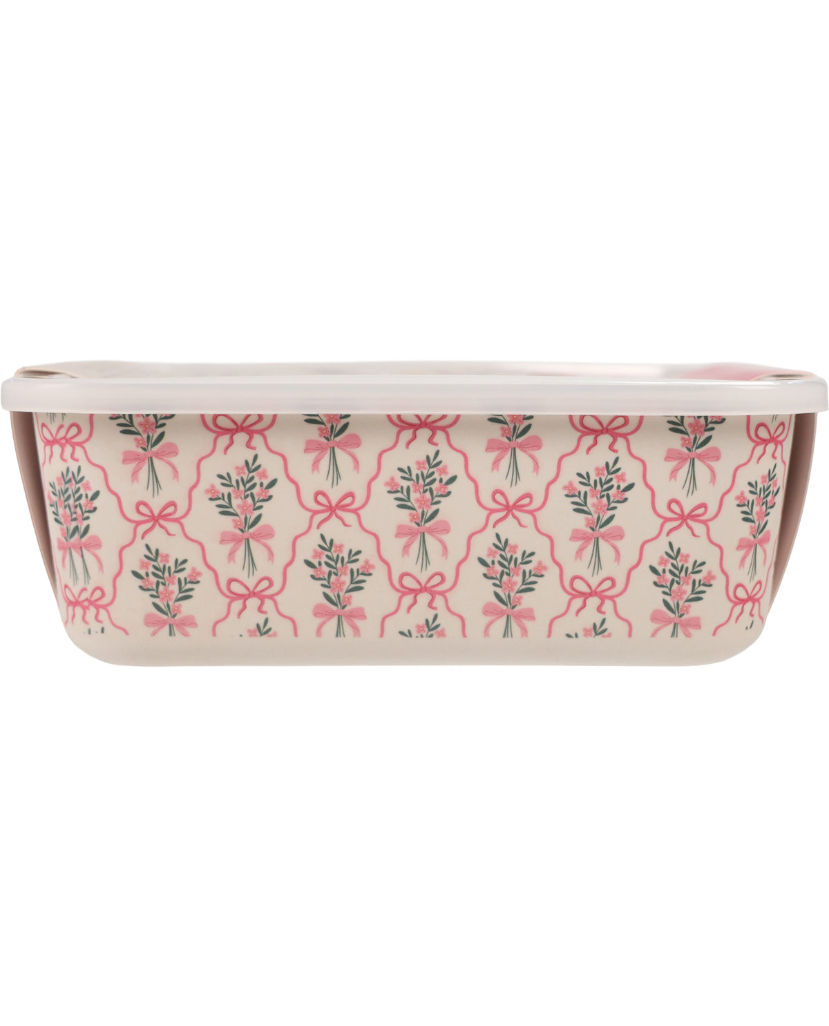 A rectangular ceramic baking pan with a white lid, featuring a pink and green floral pattern with bows on a cream-colored exterior.