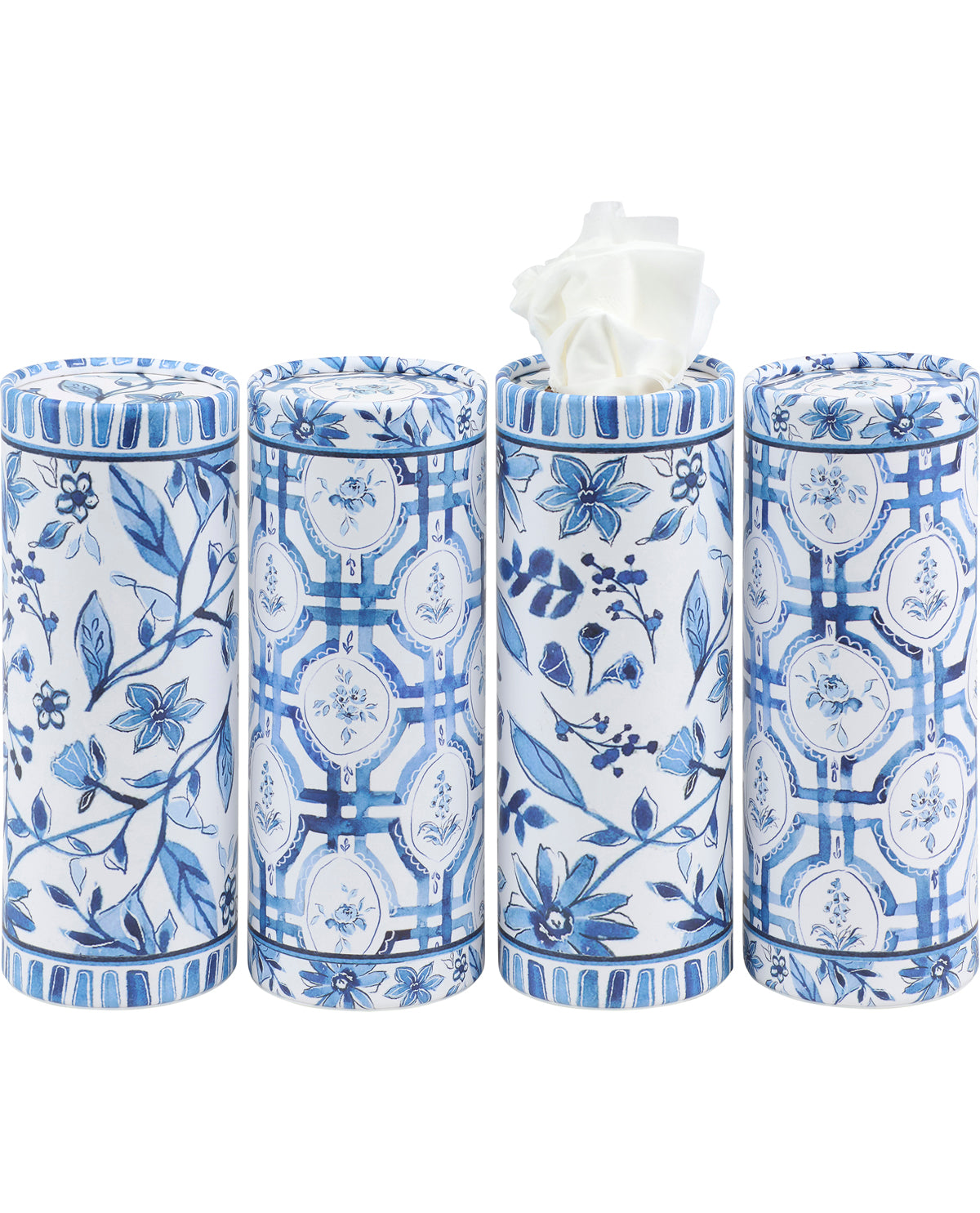 Set of four decorative tissue holders with blue floral patterns on a white background