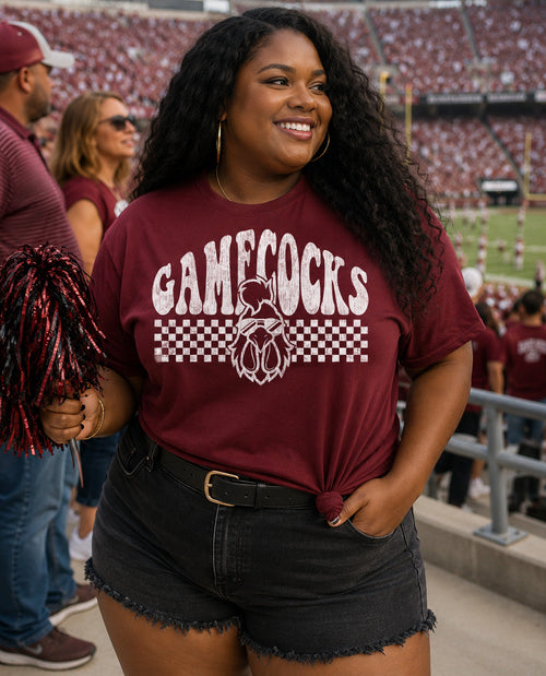 Woman wearing a 'Gamecocks' t-shirt at a sports event