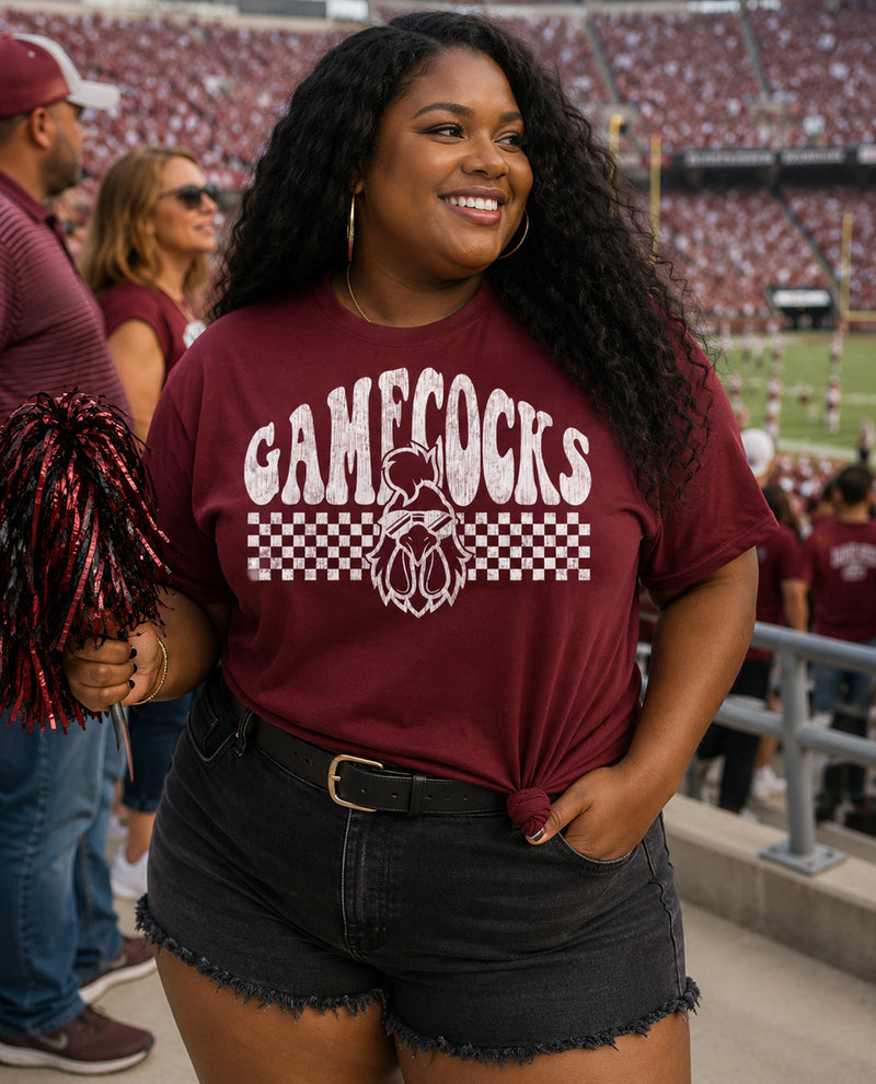 Woman wearing a 'Gamecocks' t-shirt at a sports event