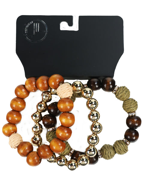Three beaded stretch bracelets displayed on a black retail card. The bracelets feature round wooden beads in light brown, dark brown, and olive green, accented with metallic gold spacers and textured beige rope beads.