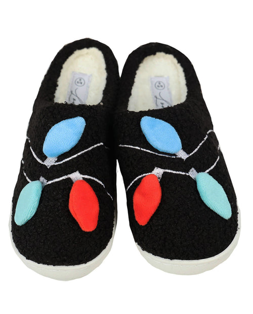 A pair of black fuzzy slip-on slippers decorated with felt Christmas light shapes in light blue, turquoise, and red, with white faux-fur lining and white soles.