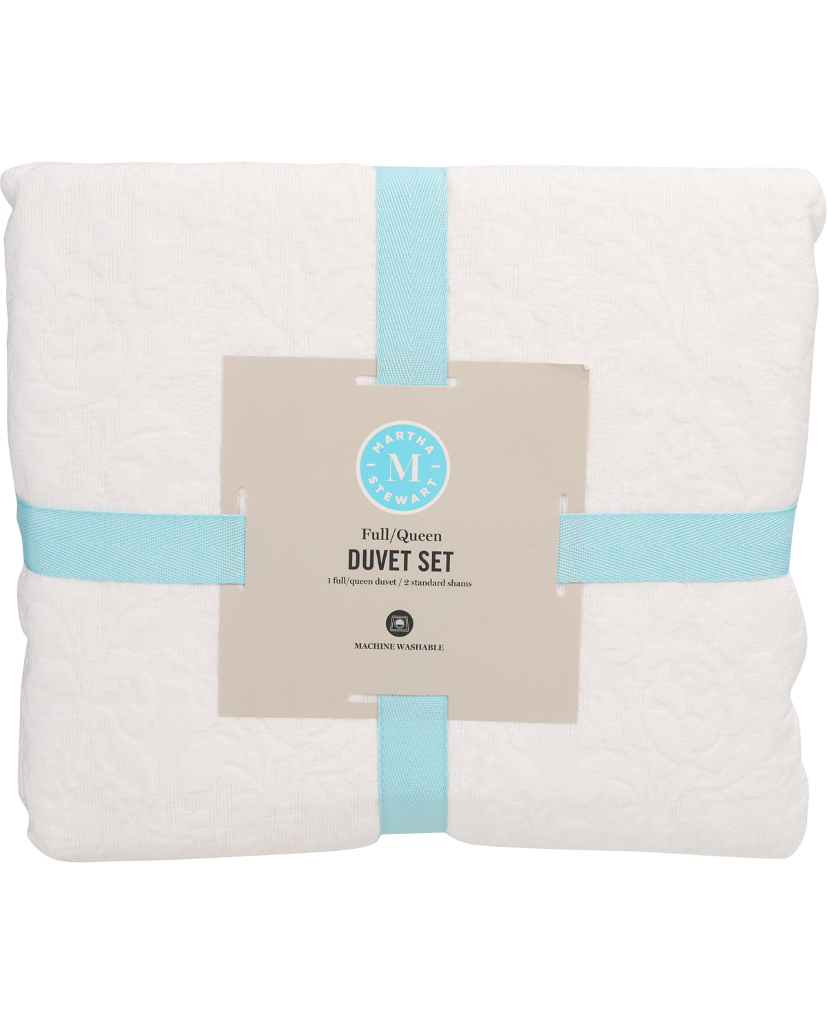 Folded white duvet set with a label on a white background
