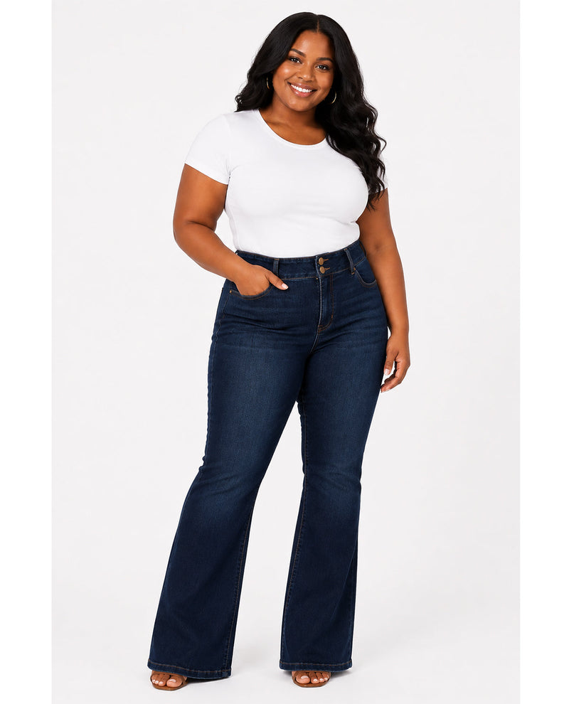 Woman wearing a white t-shirt and dark blue jeans on a white background