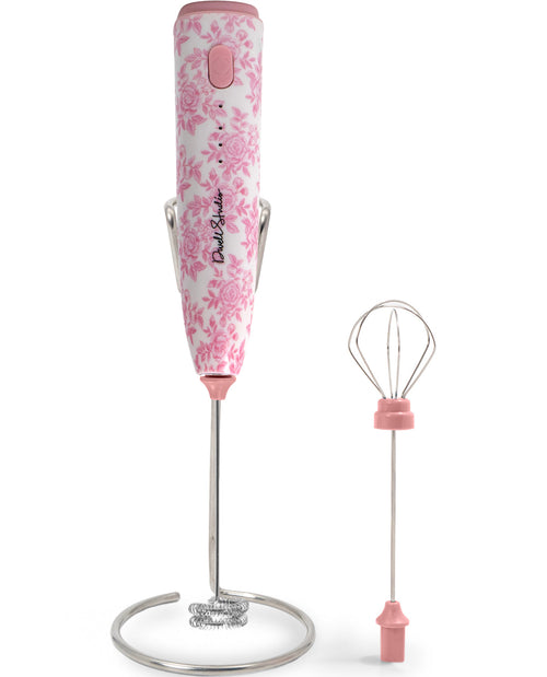 Pink floral-handled immersion blender with whisk attachment on a white background