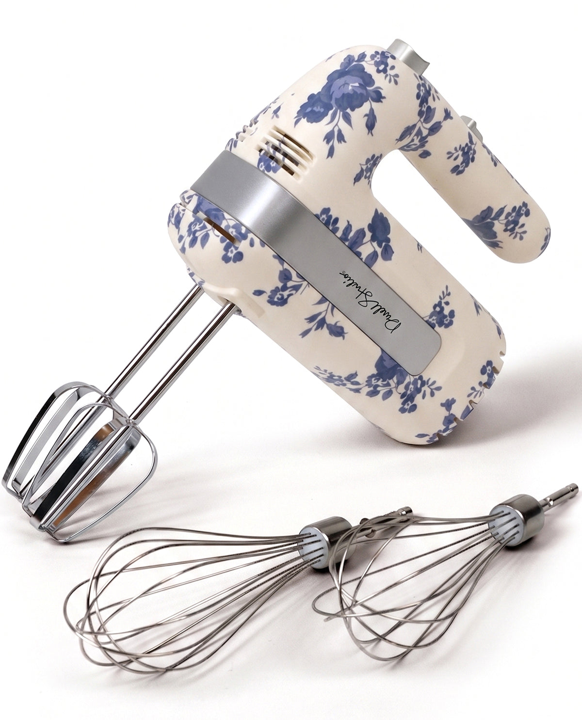 Hand mixer with floral pattern on a white background