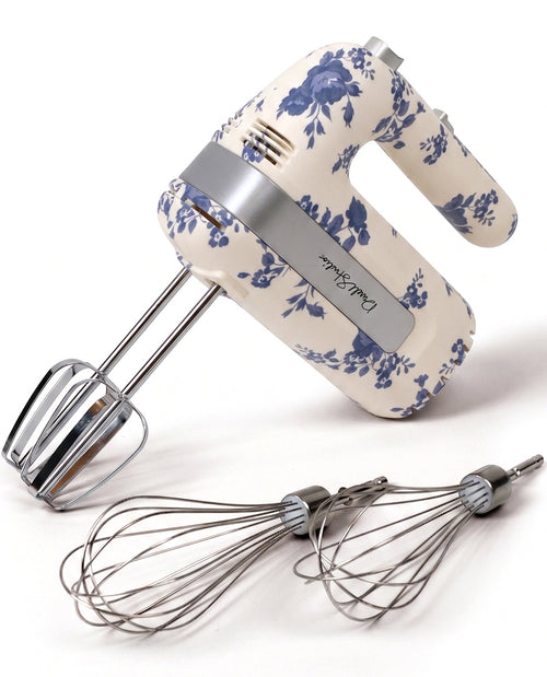 Hand mixer with floral pattern on a white background
