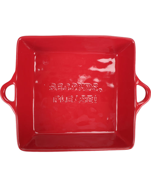 A square red ceramic baking pan with side handles and embossed text reading 'BAKING PANS, PLEASE!' on a white background.