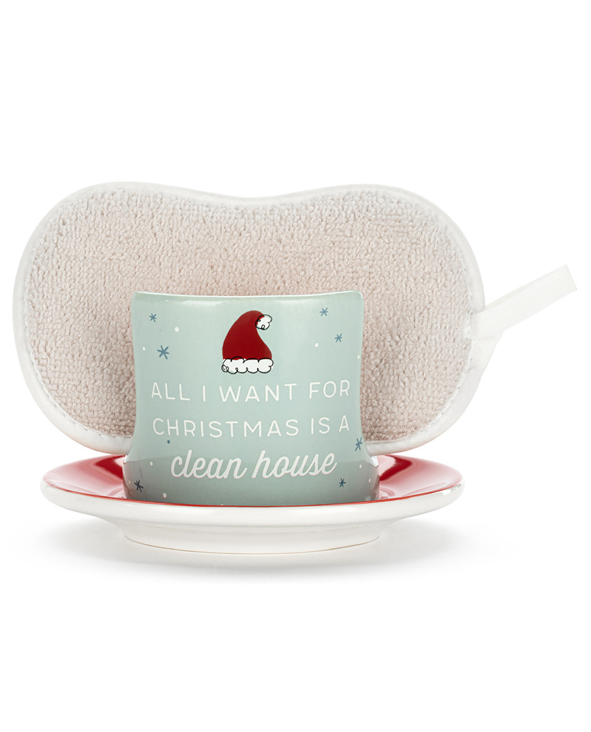 A Christmas-themed ceramic cup and saucer set with a white sponge, shown on a clean white background. The cup is light blue with a red Santa hat and the text 'ALL I WANT FOR CHRISTMAS IS A clean house'.