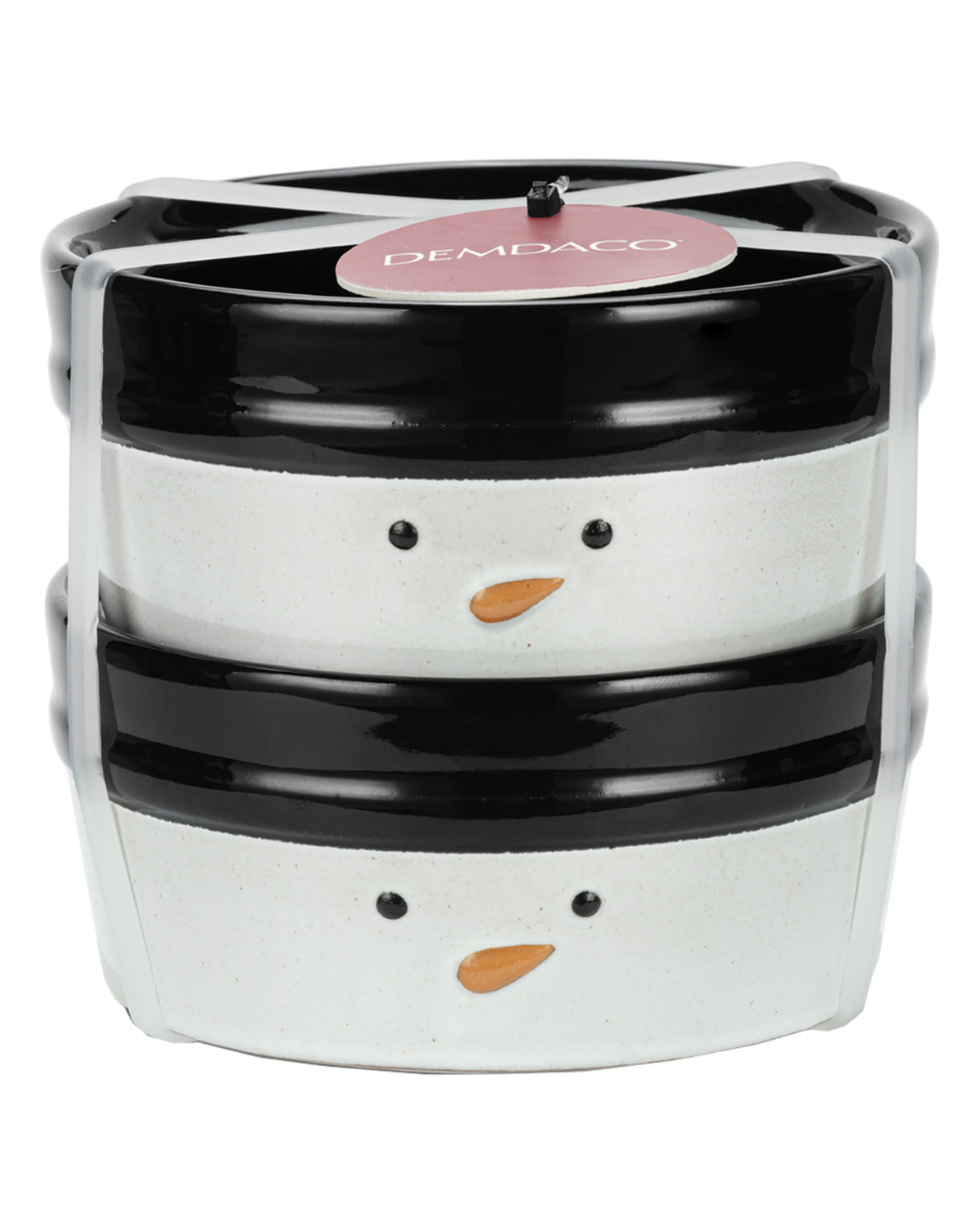 A stack of two ceramic snowman face containers or boxes by DEMPACO, featuring black and white bodies with small orange carrot noses and black eyes, wrapped in clear plastic.