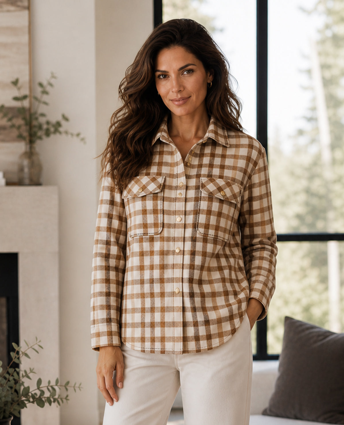 Woman wearing a plaid shirt in a home setting