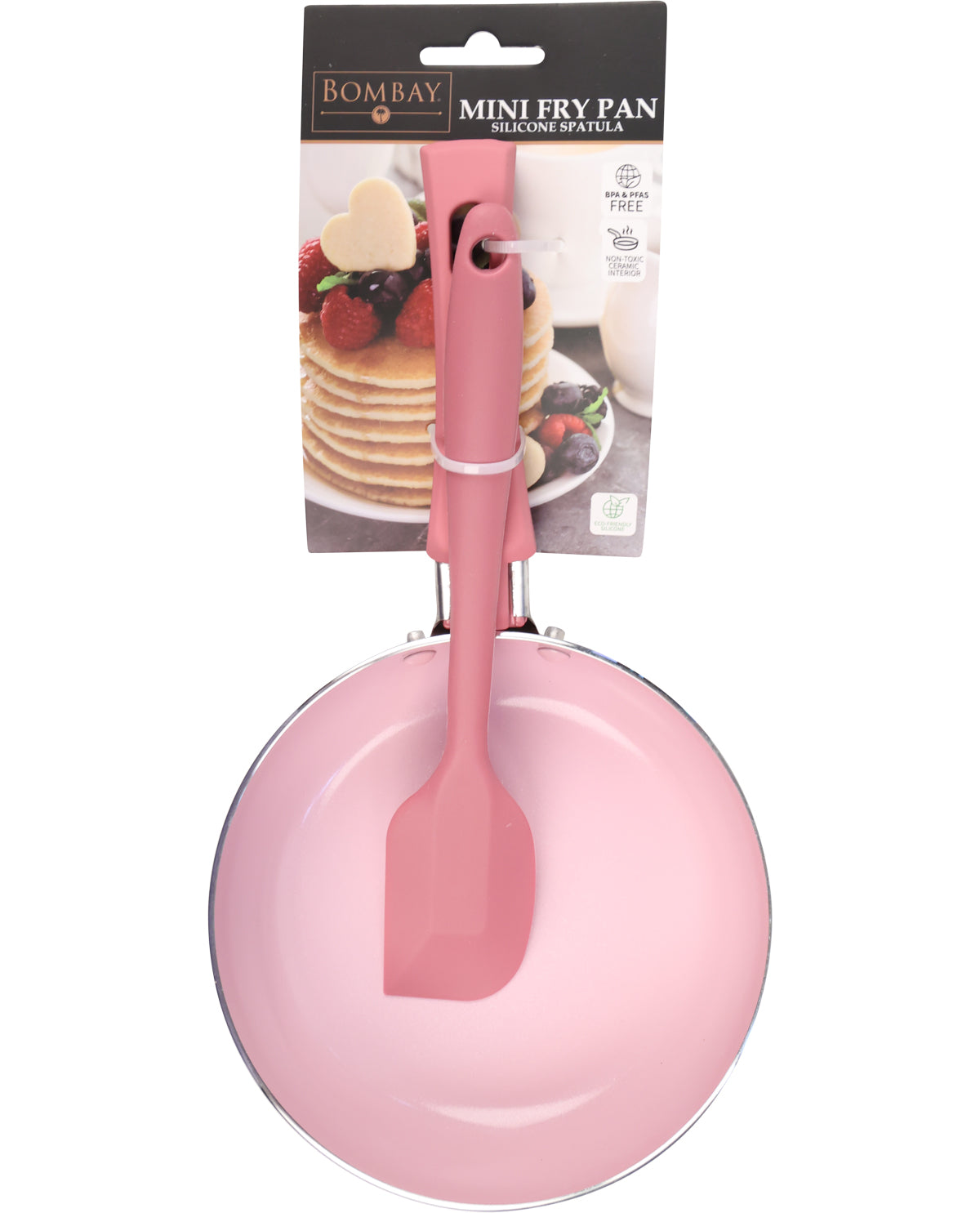 Pink mini fry pan with spatula on a white background