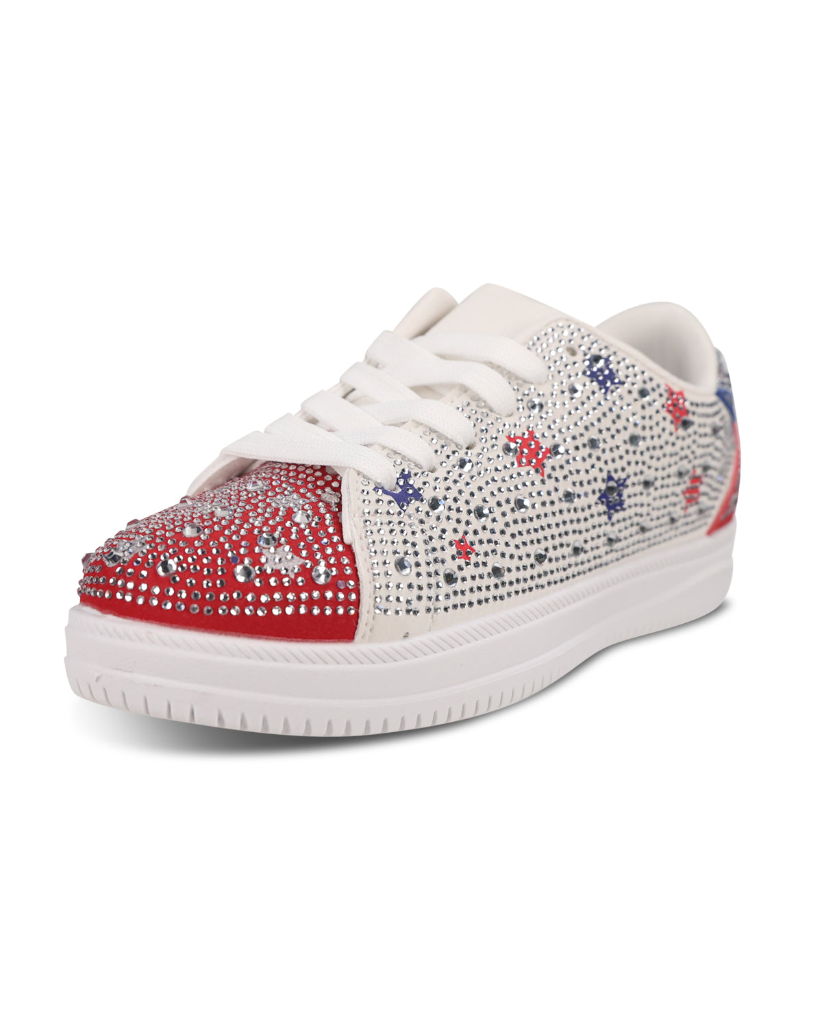 A low-top sneaker decorated with white rhinestones, featuring a solid red rhinestone toe cap and scattered red and blue star embellishments on the white upper, set against a plain white background.
