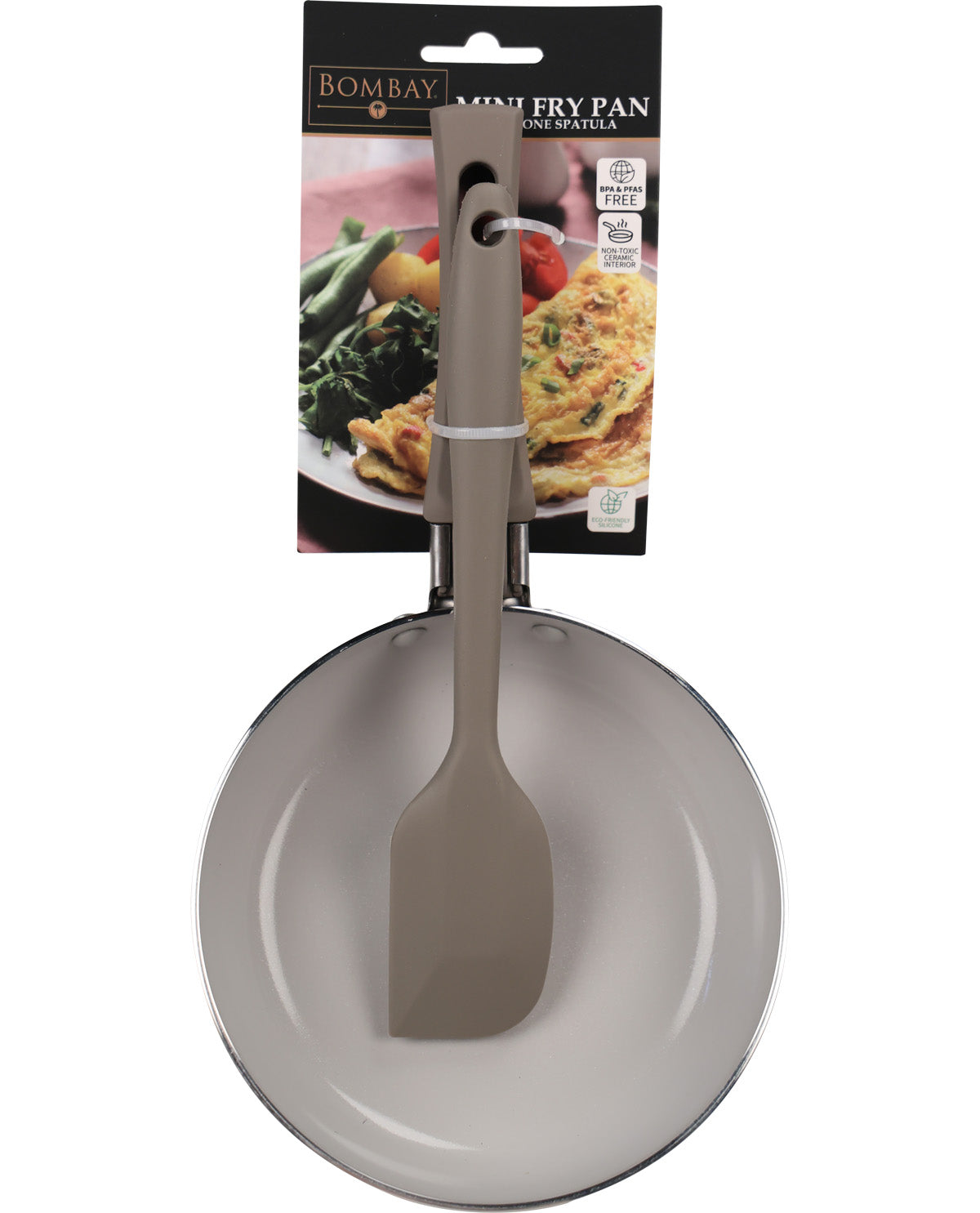 Bombay Mini Fry Pan in light gray with a matching gray spatula, packaged on a white background with its retail card visible.