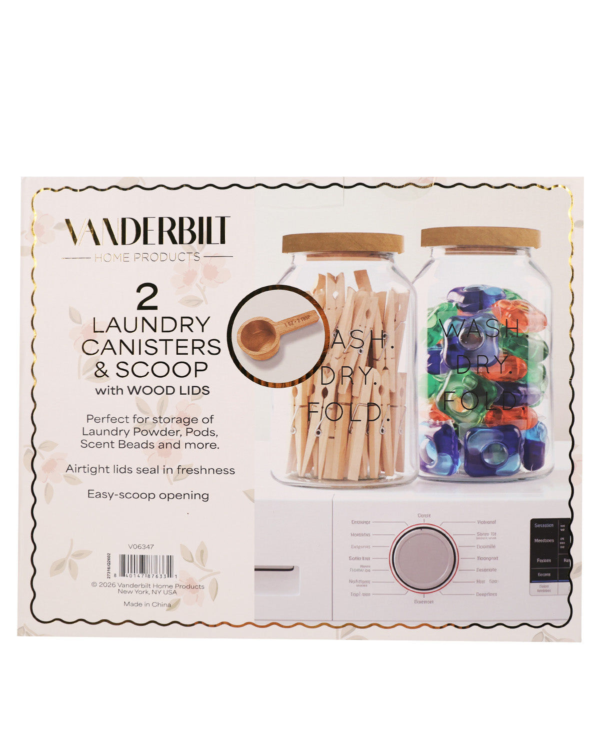Vanderbilt Life Products Laundry Canisters & Scoop kit in retail packaging, featuring two clear glass canisters with wooden lids and a white automatic scoop dispenser shown on the front of the box.