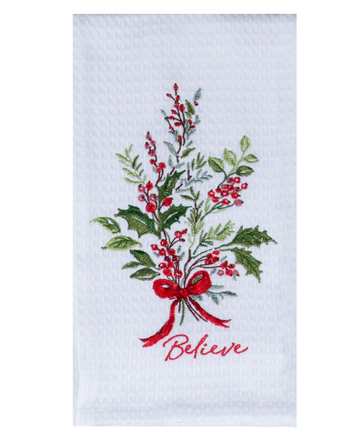Decorative towel with embroidered holly berries, green leaves, and a red ribbon with 'Believe' text on a white background.