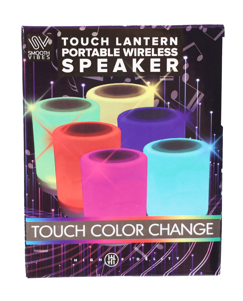 The retail packaging box for the 'Touch Lantern Portable Wireless Speaker' by Smooth Vibes. The box features a dark background with glowing neon illustrations of five cylindrical speakers in different colors (green, yellow, purple, red, and blue) and highlights the 'Touch Color Change' feature.