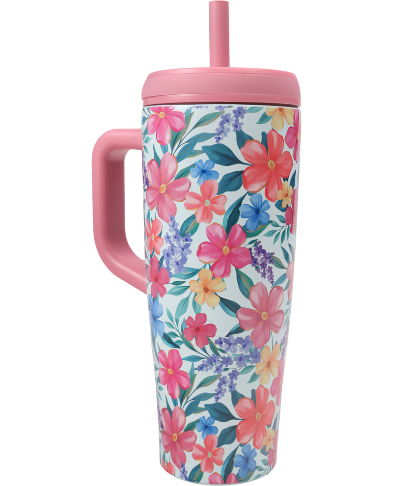 A tall handled tumbler with a pink lid and straw, featuring a colorful floral print on a white background.