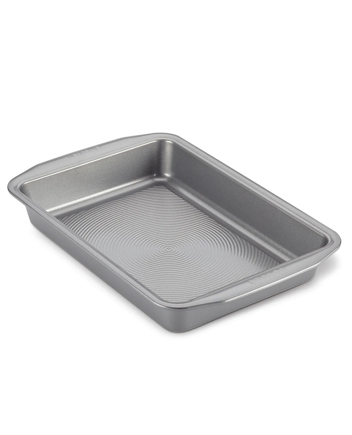 A rectangular metal baking pan with a textured, ribbed interior and raised rim, shown at an angle on a white background.