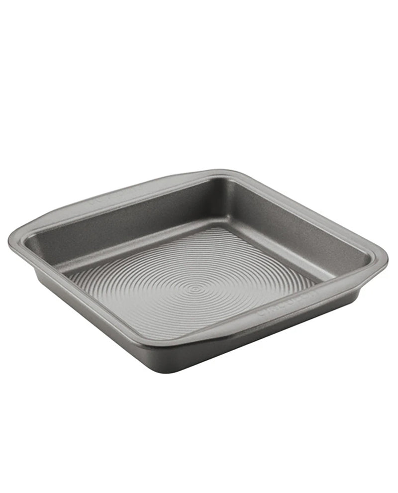 A square metal baking pan with a textured, non-stick surface and raised rim, shown on a plain white background.