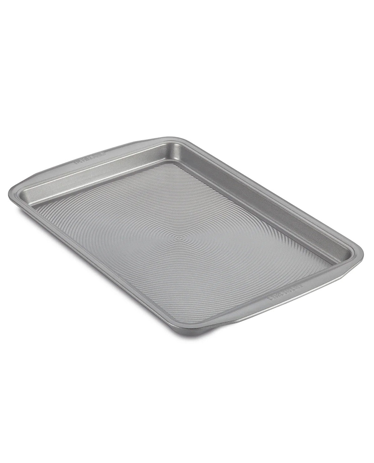 A rectangular metal baking pan with raised rim and rounded corners, shown at an angle on a plain white background.